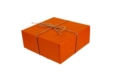Eco-friendly square orange present box tied with simple string bow Stock Photos