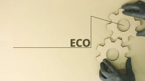 Eco friendly text and cardboard cog wheels Stock Footage 142028596