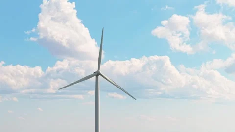 Eco-Friendly Wind Turbine Close-Up Turning Under Blue Skies in Daylight Stock Footage 313544706