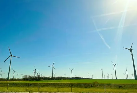 Eco friendly Wind turbines device that converts the kinetic energy of wind in Stock Photos
