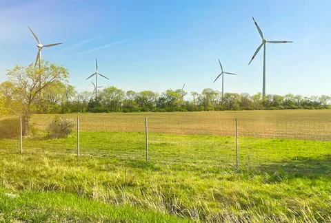 Eco friendly Wind turbines device that converts the kinetic energy of wind in Stock Photos