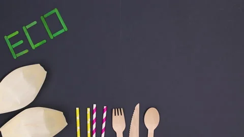 Eco friendly zero waste bamboo cutlery appear on black background. Stop motion 스톡 동영상 154973089