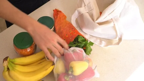 Eco Friendly, Zero Waste Shopping. Reusable produce bags for fruits and veggies Stock Footage 117687835