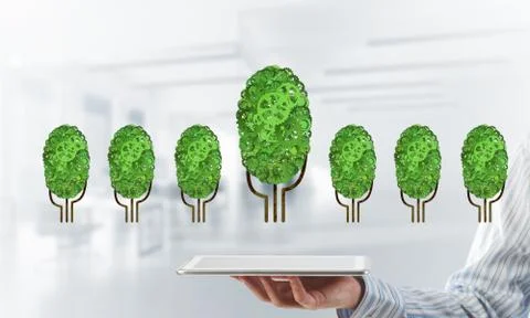 Eco green environment concept presented by tree as working mechanism or engine Foto stock