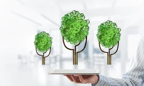 Eco green environment concept presented by tree as working mechanism or engine Foto stock