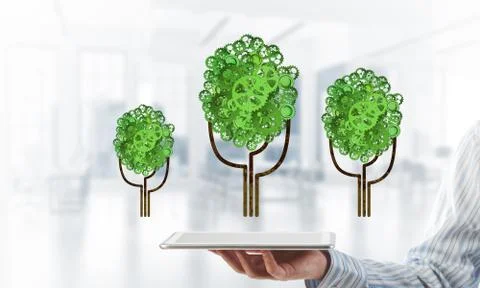 Eco green environment concept presented by tree as working mechanism or engine Foto stock
