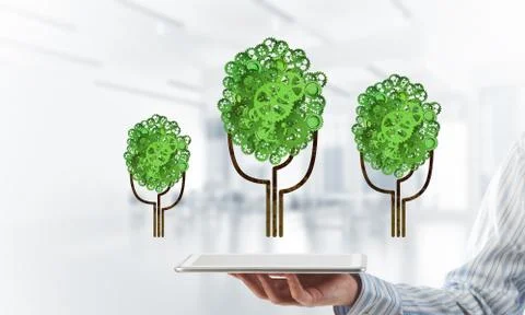 Eco green environment concept presented by tree as working mechanism or engine 스톡 사진