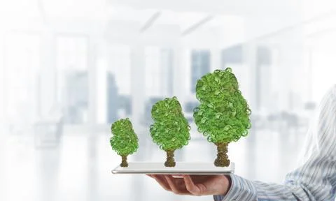 Eco green environment concept presented by tree as working mechanism or engine Foto stock