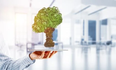 Eco green environment concept presented by tree as working mechanism or engine 스톡 사진