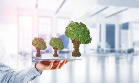 Eco green environment concept presented by tree as working mechanism or engine 스톡 사진