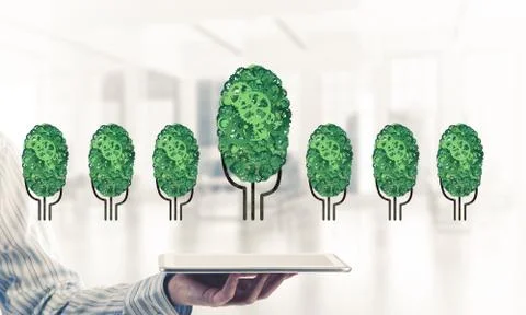 Eco green environment concept presented by tree as working mechanism or engine Foto stock