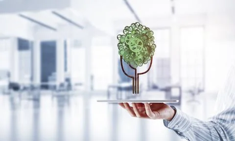 Eco green environment concept presented by tree as working mechanism or engine Foto stock
