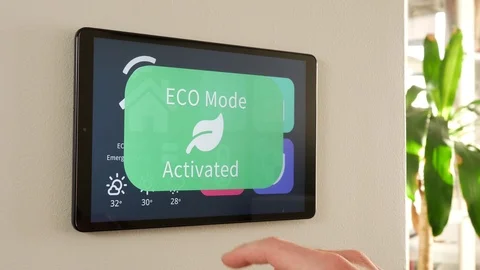 ECO Mode Activation on a Smart Home Wall Control Screen Stock-Footage 125090865