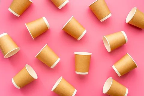 Eco paper coffee cups pattern. Top view Stock Photos