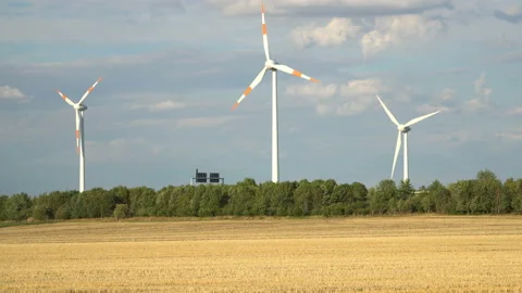 Eco power. Wind turbines generating electricity. Stock Footage 97052379