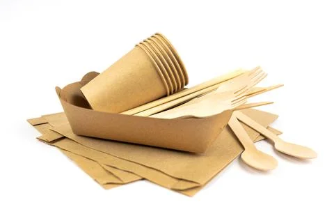 Eco tableware set isolated on white background. Craft bags, plates and cups Stock Photos