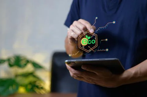 Eco Technology Concept with Tablet and Digital Elements in Hands Stock Photos
