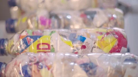 Ecobricks Made From PET Bottles Packed Solid With Used Plastics - Closeup Stock Footage 127875570