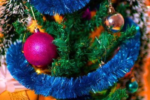 Ecologic Christmas tree made from gift boxes and rustic Christmas decorations on Stock Photos