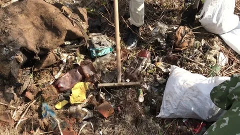 Ecological action authentic, garbage collection, nature protection. Plastic Stock Footage 76637819