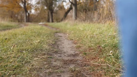 Ecological concept plastic pollution. An irresponsible man in blue jeans throws Stock Footage 120872707