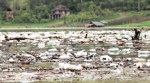 Ecological disaster, large amount of garbage in the lake after storm. Stock Footage