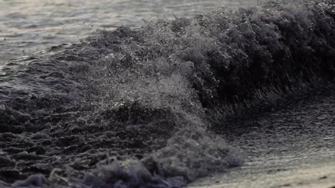 An ecological disaster waves dark water throws out garbage. Droplet splashing Stock Footage 147655289