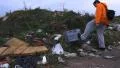ecological man on the  dump trash by the road Video HD