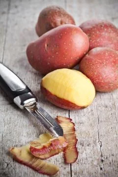 Ecological peeled potatoes Stock Photos