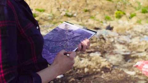 Ecologist during the research on garbage dump. Stock Footage 90183848