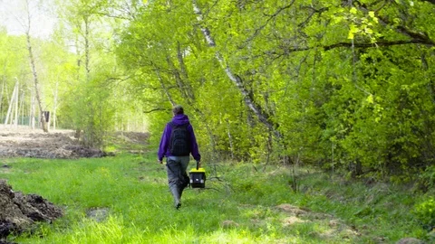 The ecologist going to the place of research. Stock Footage 90028366