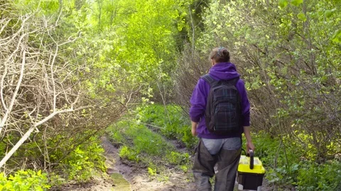 The ecologist going to the place of research. Video stock 90029041