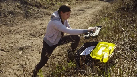 Ecologist measuring young trees Stock Footage 107378344