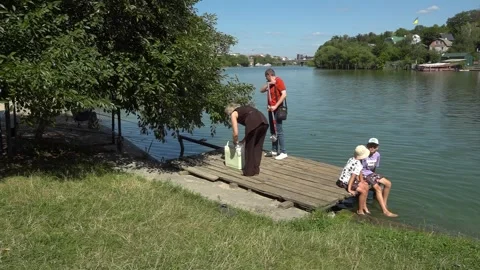 Ecologist taking water sample from a polluted river. Stock Footage 342118254