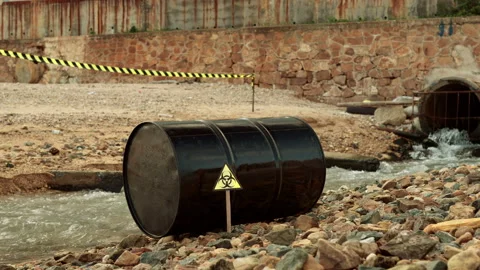 Ecologists sample water contaminated with dangerous, waterhazard toxins in tube Stock Footage 199230007