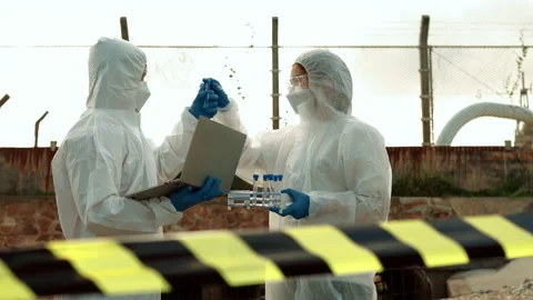 Ecologists sample water contaminated with dangerous, waterhazard toxins in tube Stock Footage 199232858