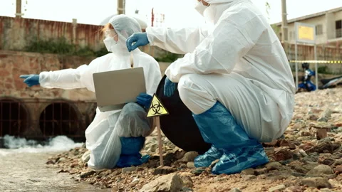 Ecologists sample water contaminated with dangerous, waterhazard toxins in tube Stock Footage 199235819