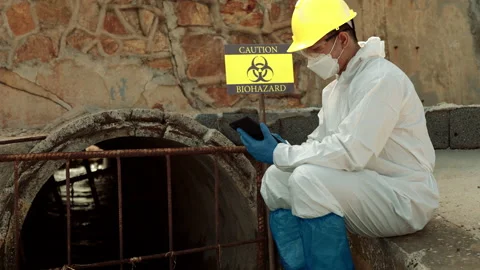 Ecologists sample water contaminated with dangerous, waterhazard toxins in tube Stock Footage 199240838