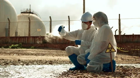 Ecologists sample water contaminated with dangerous, waterhazard toxins in tube Stock-Footage 199244258