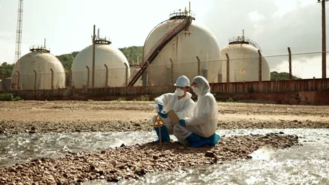 Ecologists sample water contaminated with dangerous, waterhazard toxins in tube Stock-Footage 199245185