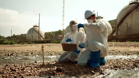 Ecologists sample water contaminated with dangerous, waterhazard toxins in tube Stock-Footage 199246450
