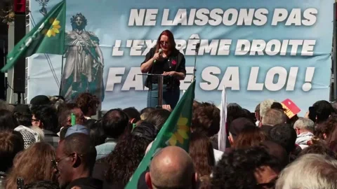 Ecologists take part in left-wing protest before National Group rally, París, FR Stock Footage 306005046