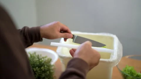Ecology compost supply kitchen waste sorting waste vegetable peels from cutting. Stock Footage 252637896