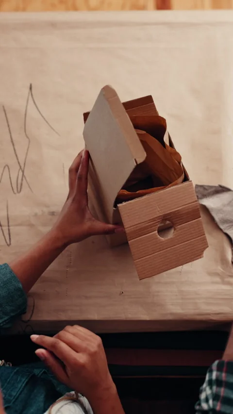 Ecommerce, people or packing box of leather in workshop for delivery, logistics Stock Footage 333167930