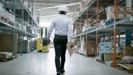 Ecommerce Warehouse Manager Inspects Inventory At Shipping Centre. Stock Footage