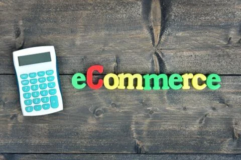 Ecommerce on wooden table Photos