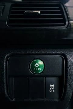 Econ button on dashboard of modern car Stock Photos