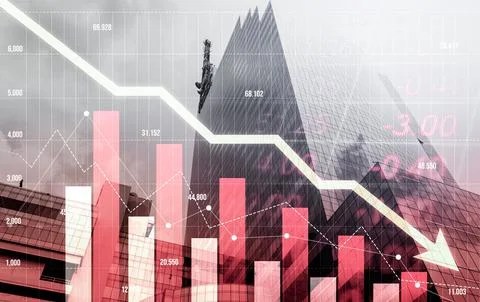 Economic crisis concept graphs falling down with modernistic urban, city area. 写真素材