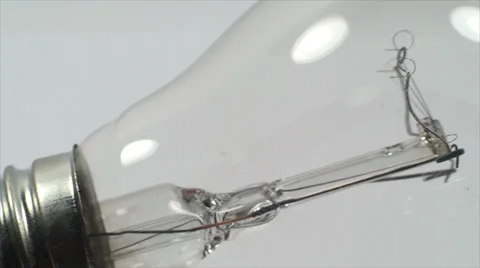 Economic Light Bulb On A White Background, Power, Light, Eco, Friendly, Tilt Stock Footage 39351034