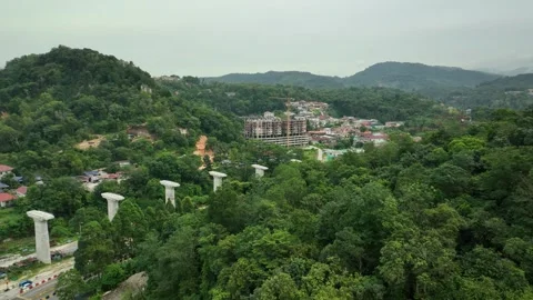 ECRL Construction Progress in Gombak Area Amidst Lush Landscape Stock Footage 320752364